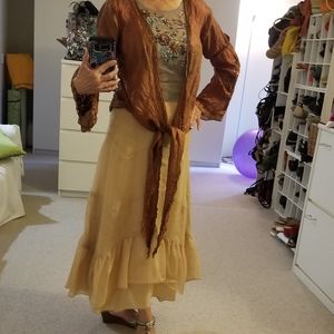 Beaded copper color lightweight cover with flared sleeves.